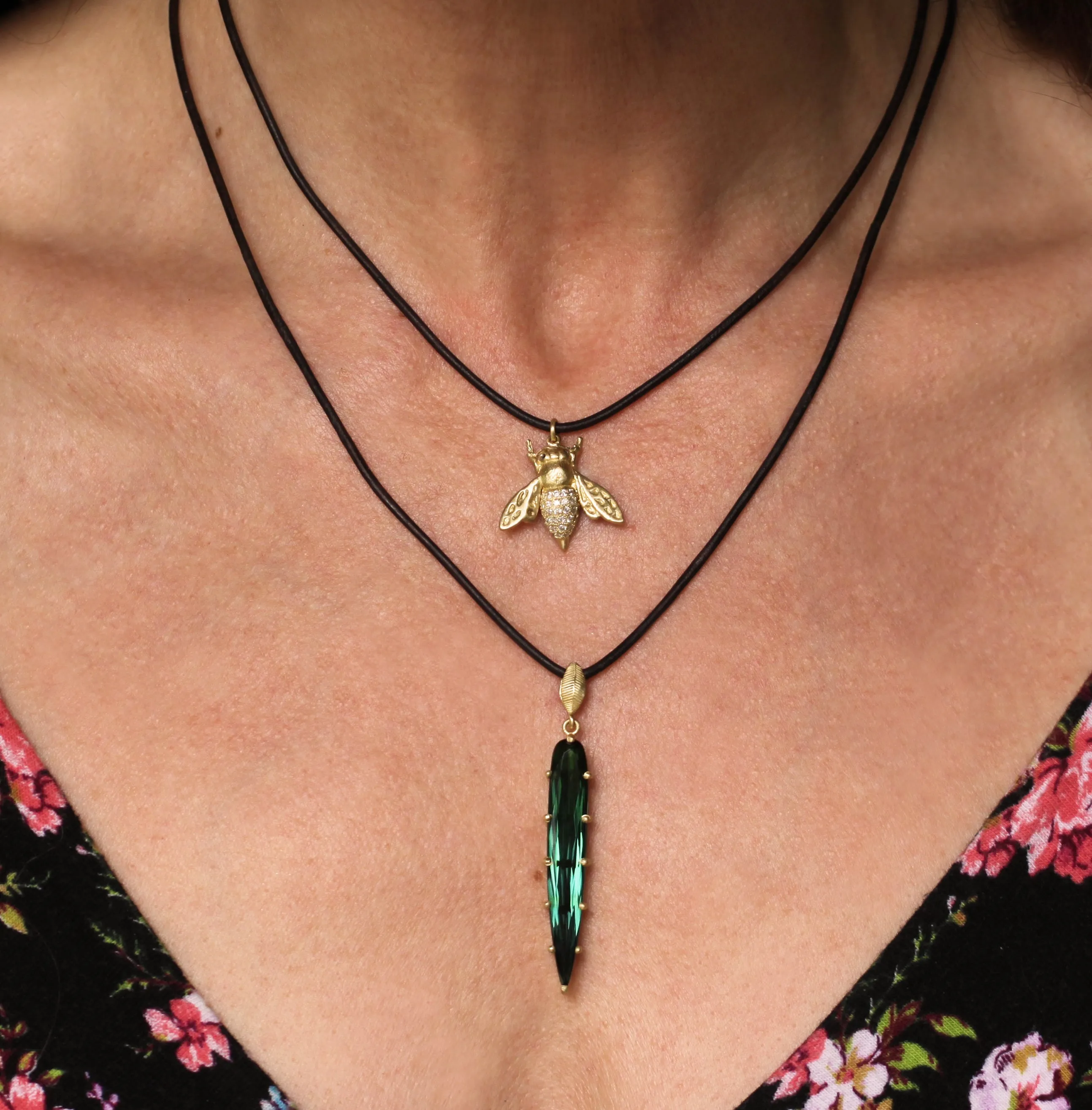 A Diamond Bee Pendant on Leather