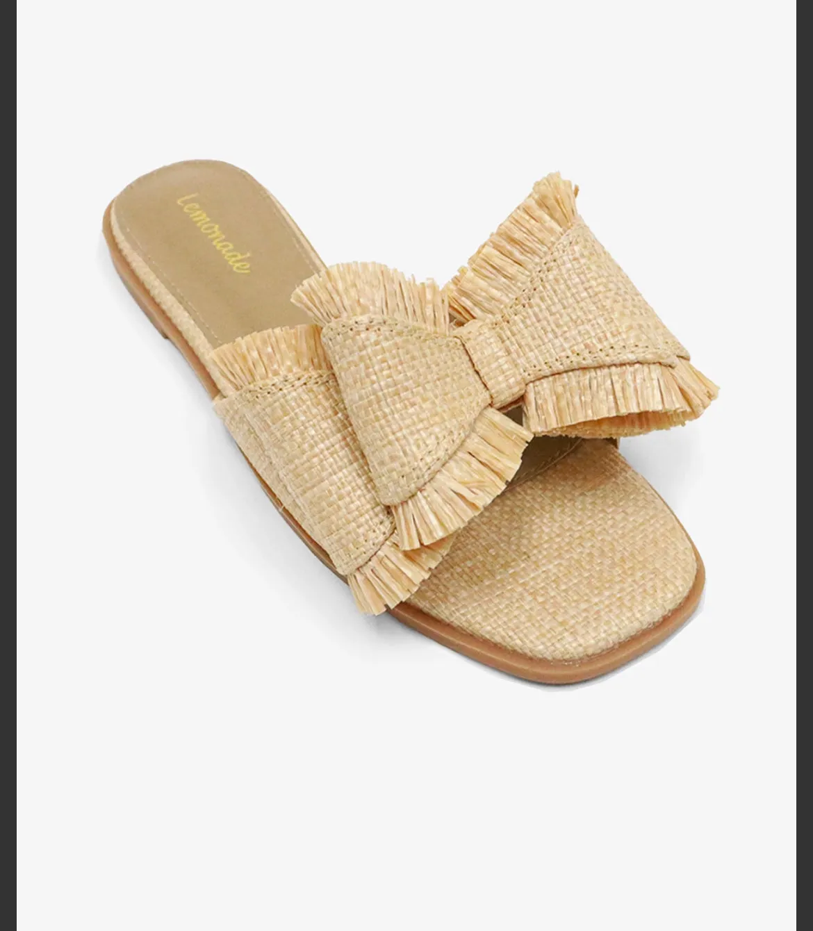 Bow Tie Flat Sandals Available In Natural and Black